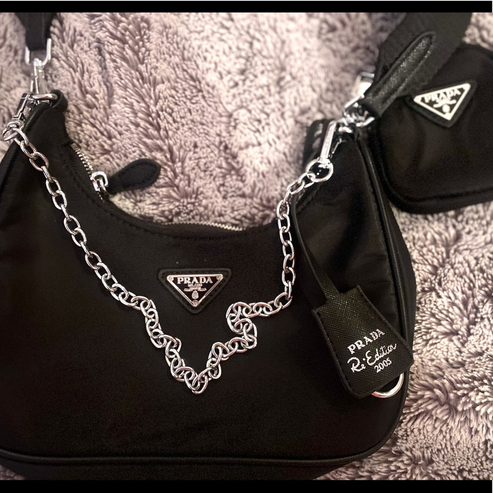 Black nylon 2005 re-edition bag.